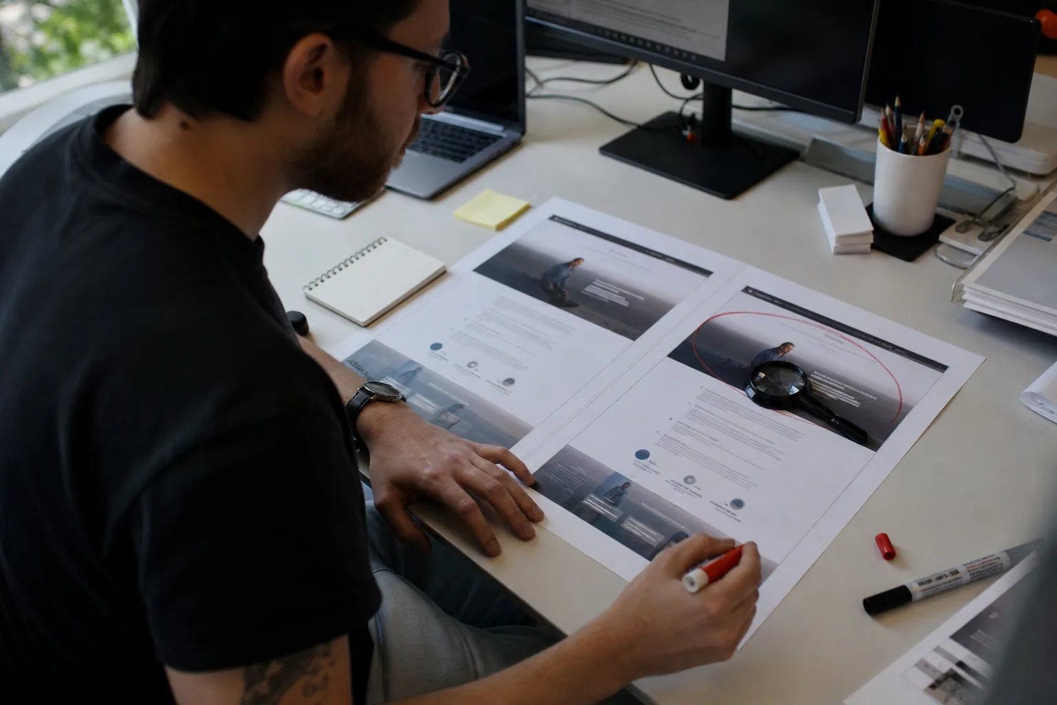 Two printed screenshots of a web page side by side with a changed banner area circled in red